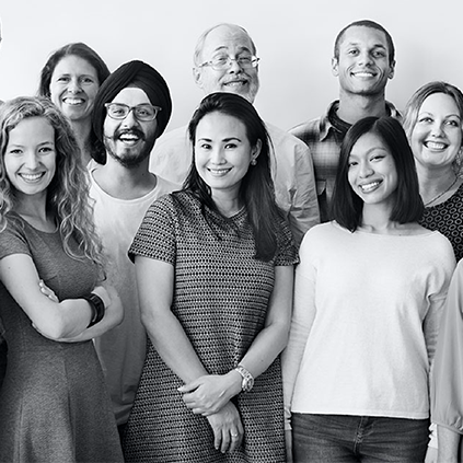 a group of people in grayscale